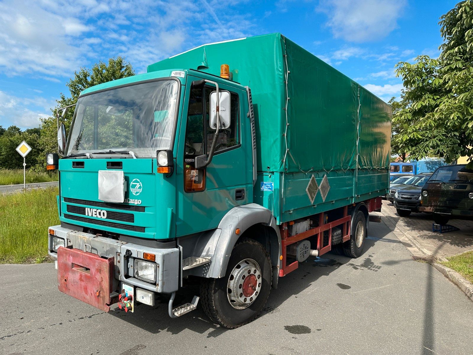 IVECO  ML135 E23 Curtain side 4x4 camión toldo < 3.5t